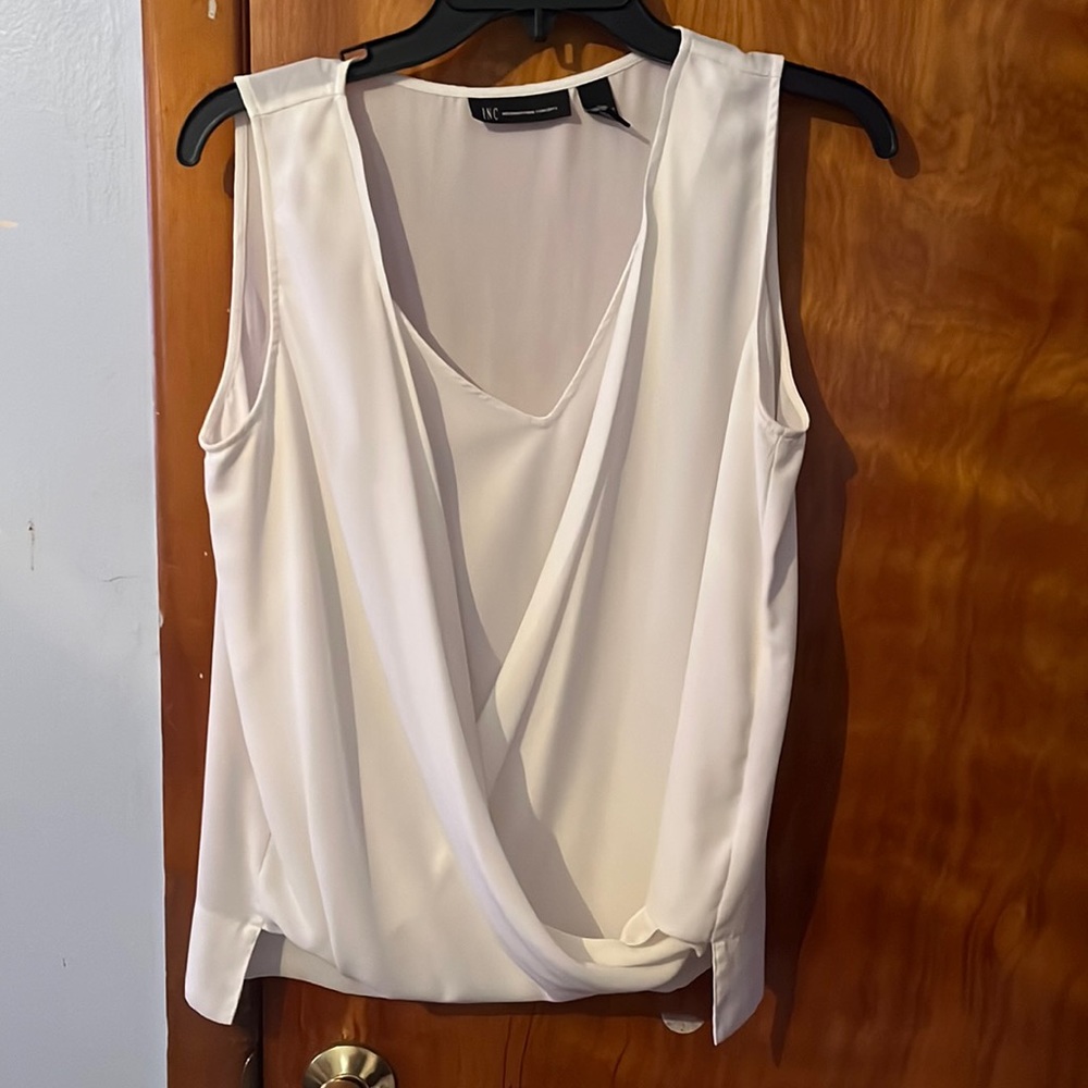 Polyester criss cross front tank top.